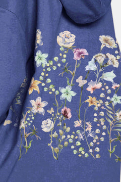 Floral pattern on a blue fabric background