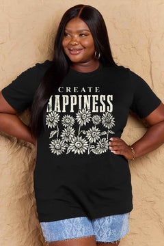 Black Tshirt with round neck and short sleeves, the caption in capital letters says CREATE HAPPINESS, with create being in small letters centered over Happiness. underneath the letters, in white as well, ten flowers arranged in three rows.