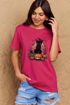Dark Pink t-shirt with a Halloween design featuring a black cat, pumpkins, leaves and bats in front of full orange moon.