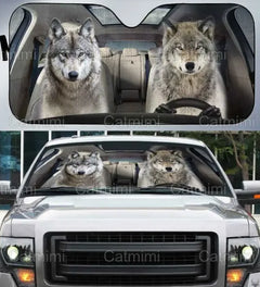 Car with wolf-themed sunshades on the windshield and rearview mirror, featuring the brand 'Catmimi'.