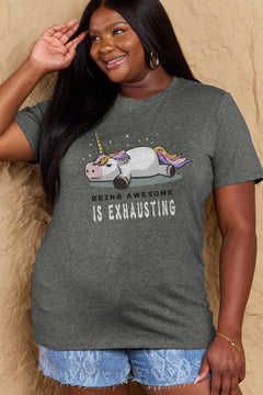 Grey Tshirt with a unicorn laying on it's belly with all legs splayed out and the slogan BEING AWESOME IS EXHAUSTING under it. Round neck and short sleeves