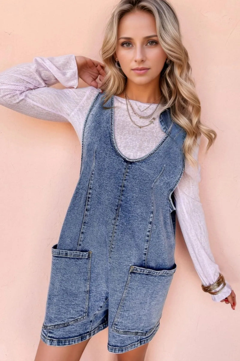 U Neck Patched Pocket Denim Overall shorts. Big front pockets on the thighs and faded blue with double stitched hem and trimming. 