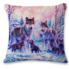 Decorative pillow with a winter scene featuring wolves and their cubs.