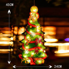 Decorative Christmas tree lighted  ornament on a blurred background