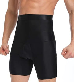 Black compression shorts worn by a person on a white background