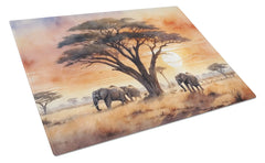 Glass cutting board with elephants and trees design