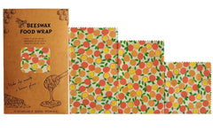 Beeswax food wrap with colorful pattern and packaging on a white background