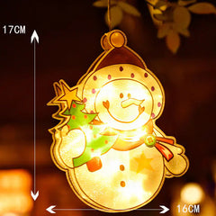 Decorative lighted snowman ornament with measurements on a blurred background