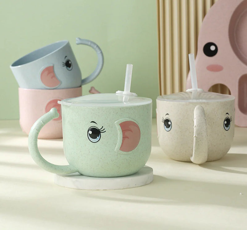 Set of cartoon-style baby mugs with faces and the handle designed to look like an elephant's trunk. pastel colors and plastic lips with straws.