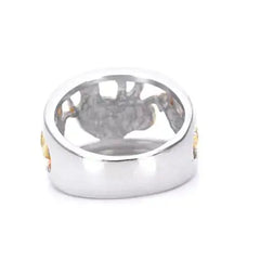 Silver ring with engraved design on a white background