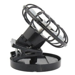 Black portable fan with transparent cage on a white background has clip to mount