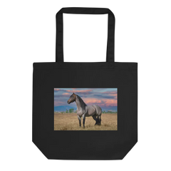 Black tote bag with a horse in a field design on a white background